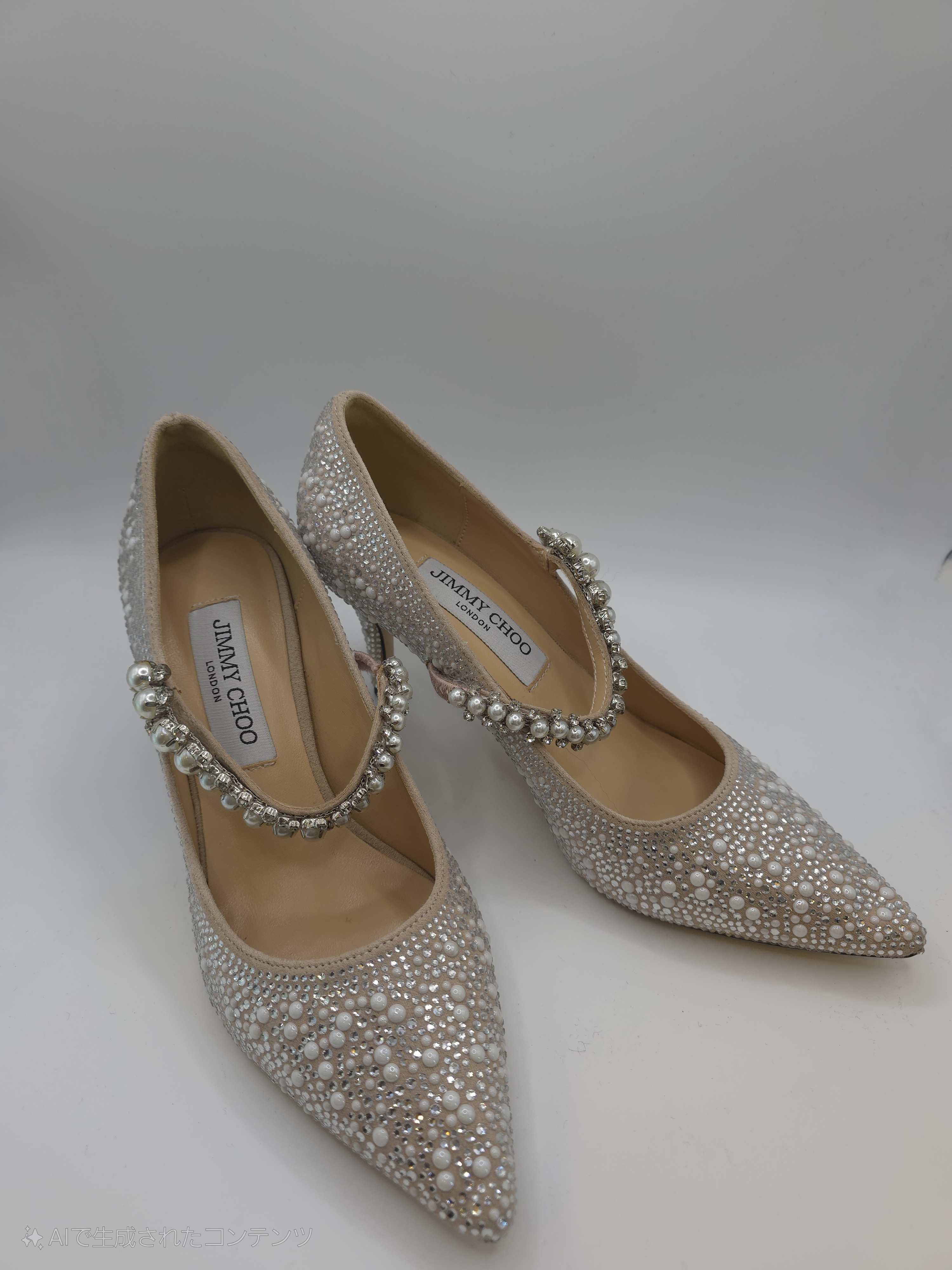 ジミーチュウ　華やかパールとビジューのパンプス